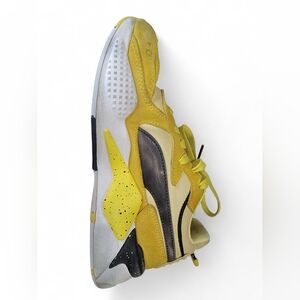 Puma Yellow and Black Sneakers